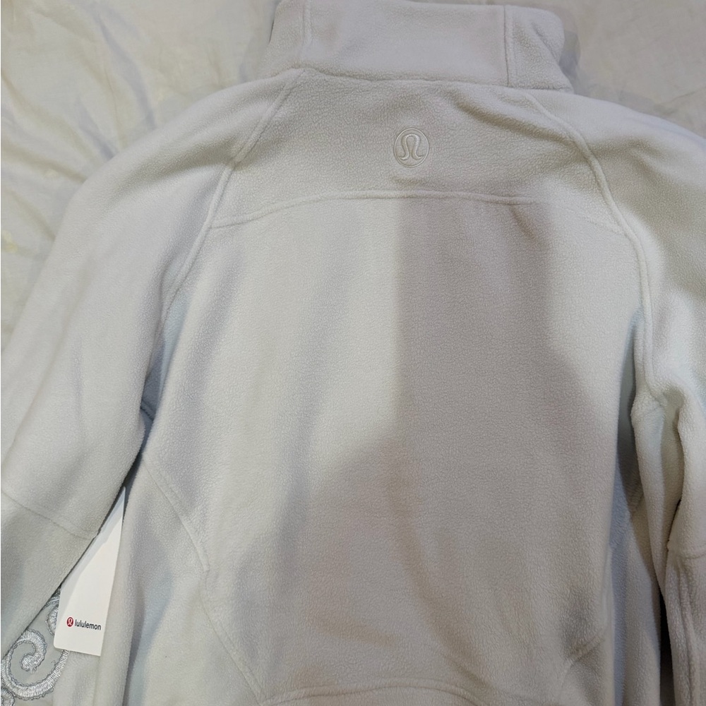 Scuba Tumbled Fleece Funnel-
Neck Half Zip
Colour Bone/Gold
Size XL/XXL - Picture 9 of 10